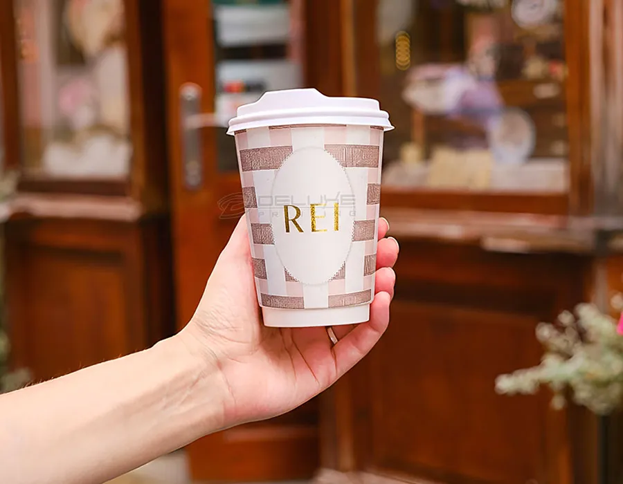 holding customized paper cups